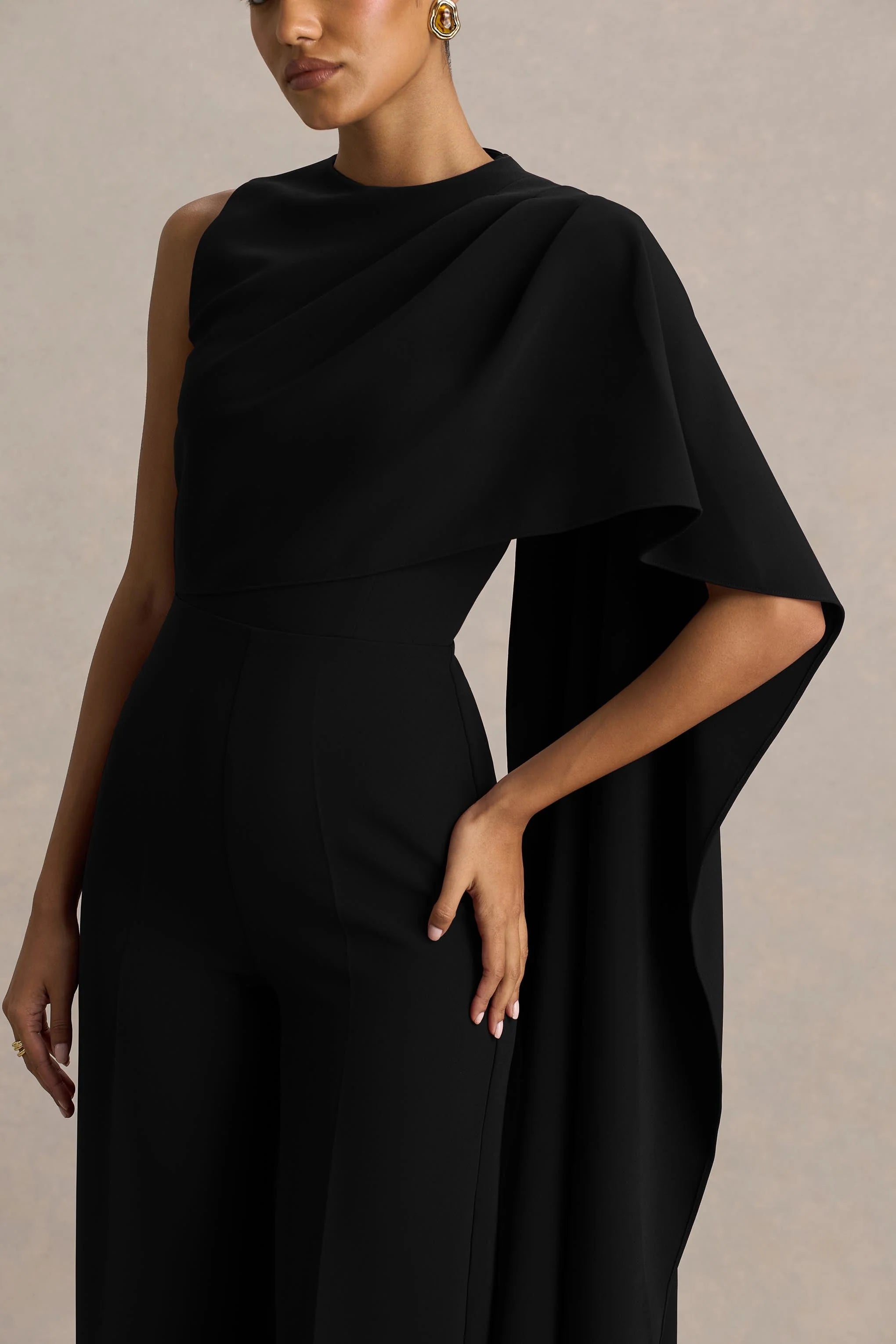 Sorenia Black High Neck Jumpsuit With One Cape Sleeve
