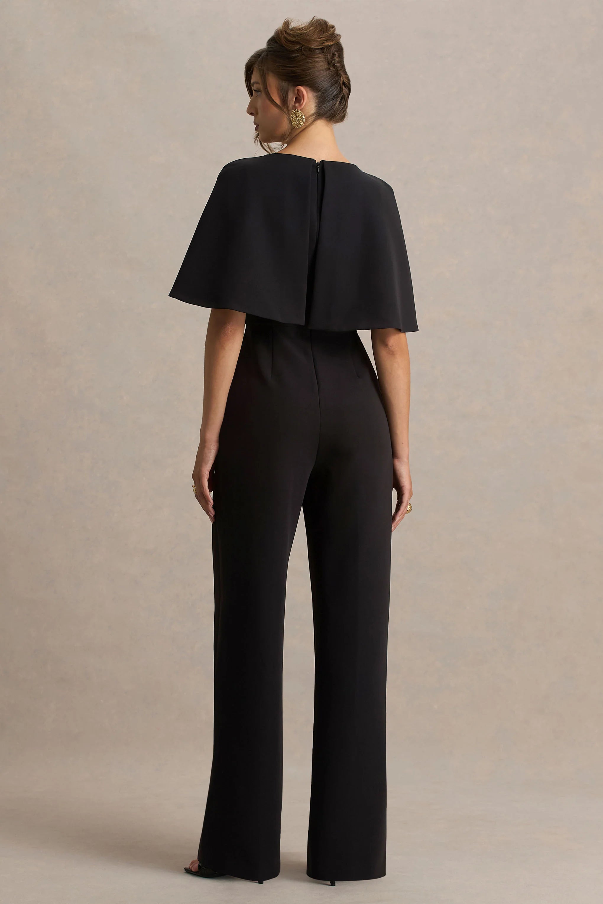 Vivid Black Plunge Neck Jumpsuit With Bow Detail